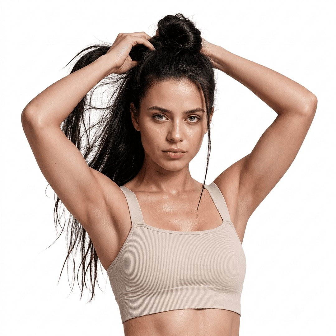 Woman in sportswear tying her hair